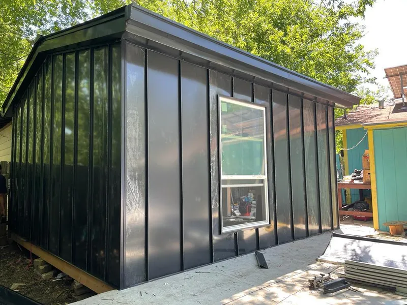 Black standing seam metal wall panels for Metal Roof Installation in Riverton