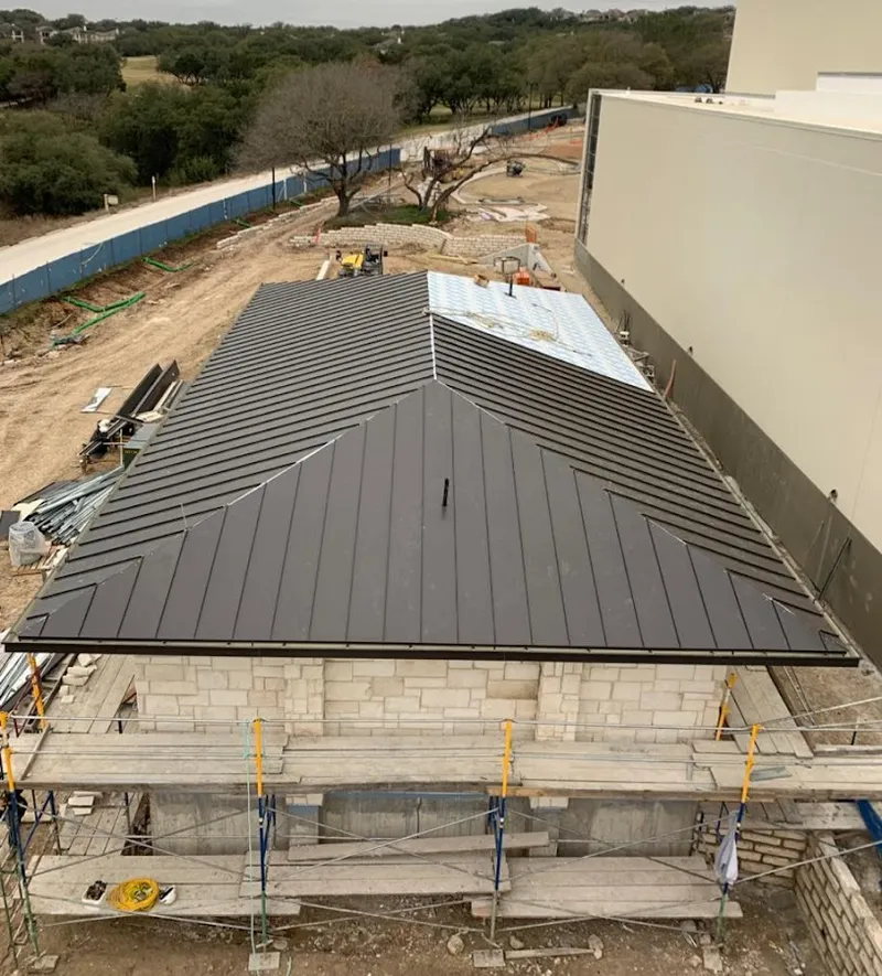 Metal roof new construction with scaffolding in Riverton