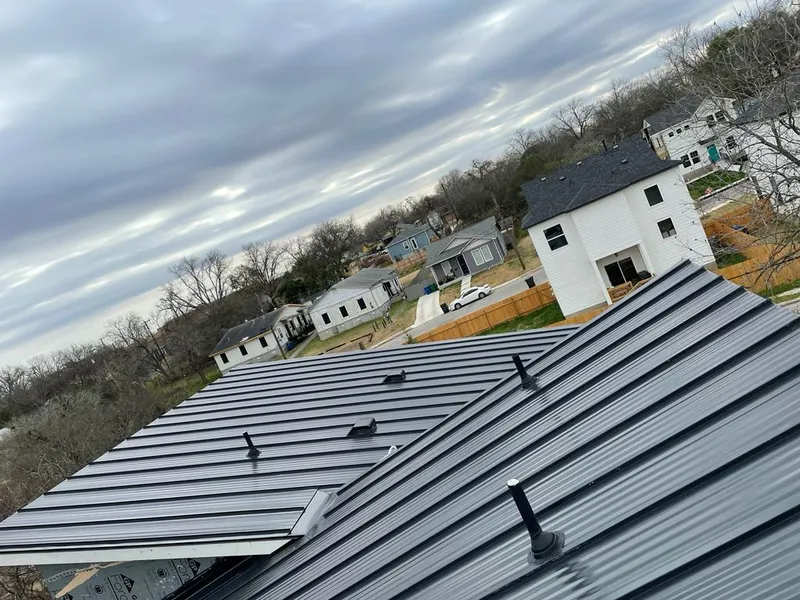 Standing seam metal roof panels with vents for Skylight Repair in Riverton